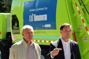 Holyday isn't going to lose any votes because of the scandal surrounding the truck behind him. But he might because of the guy to his left.