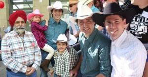 Trudeau with Calgary Skyview candidate Darshan Kang and Calgary Confederation candidate Matt Grant